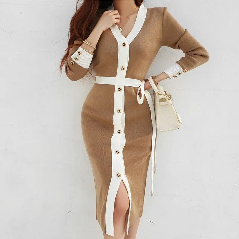 Tan knitted dress with white trim, button-down front, and waist belt by Lunara