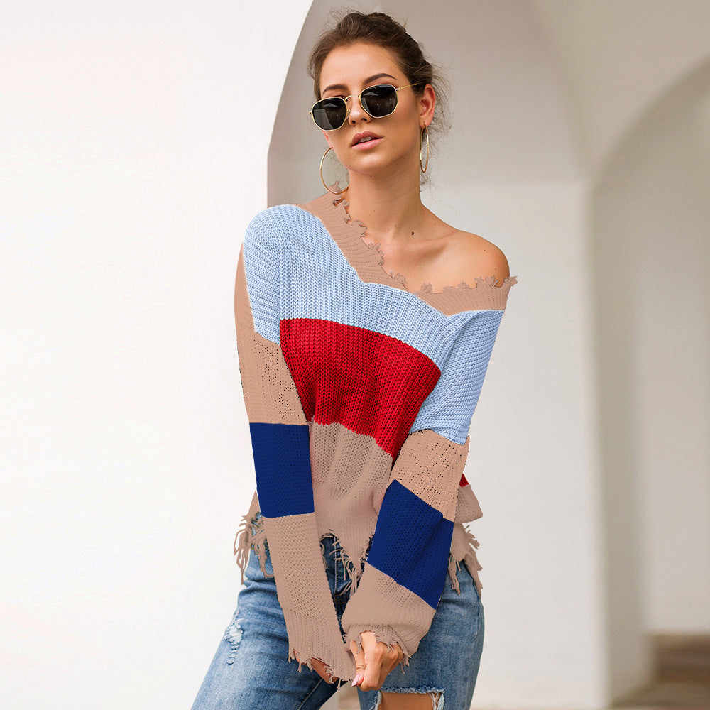 Loose Knit Sweater with Wave Fringe Hem