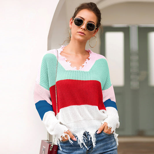 Loose Knit Sweater with Wave Fringe Hem