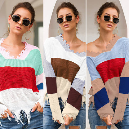Loose Knit Sweater with Wave Fringe Hem